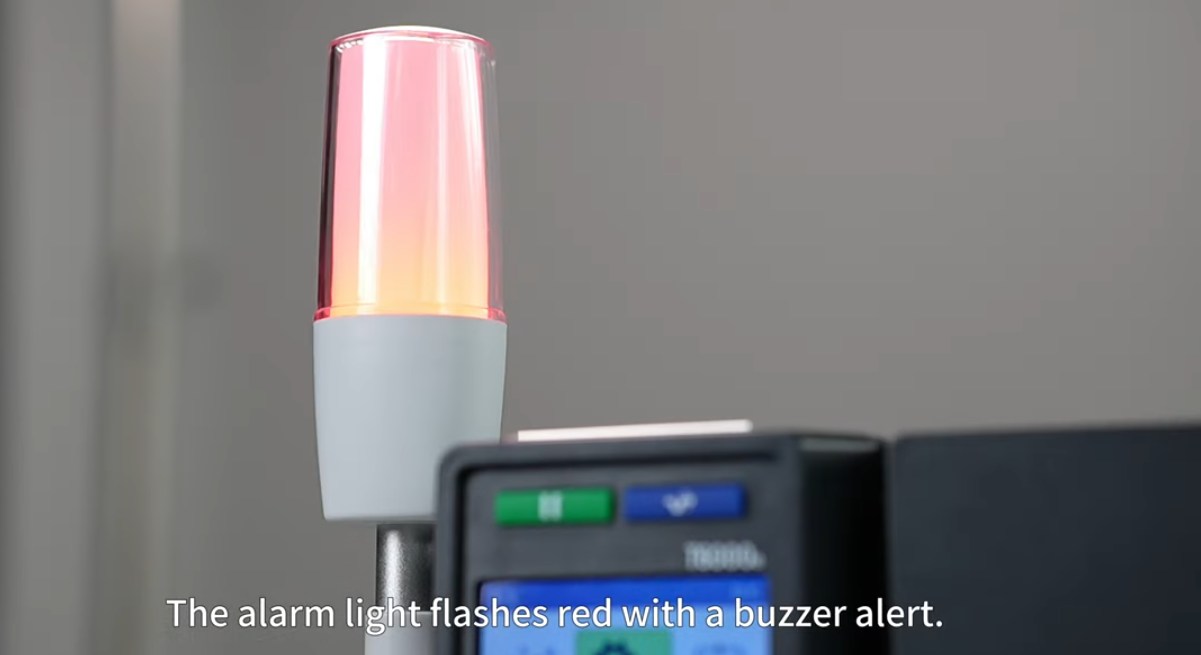 Printronix T6000 installation showing the BLC alarm light